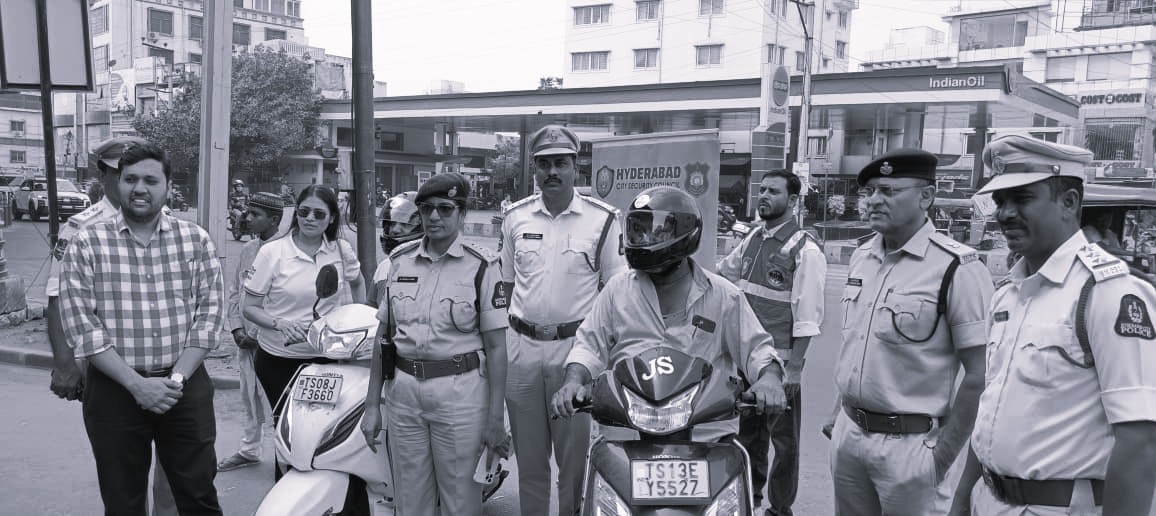 Traffic Awareness Seminar Held in Nanal Nagar, Free Helmets Distributed
