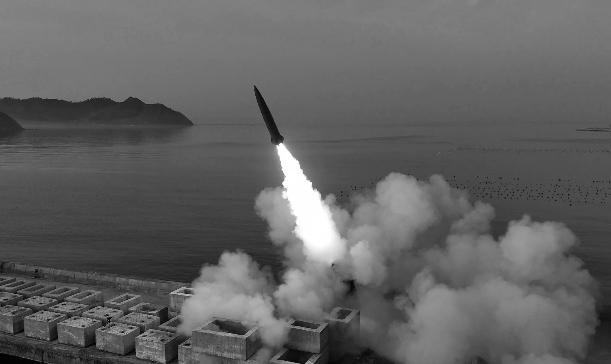 North Korea conducts cluster missile test, daughter appears at launch site